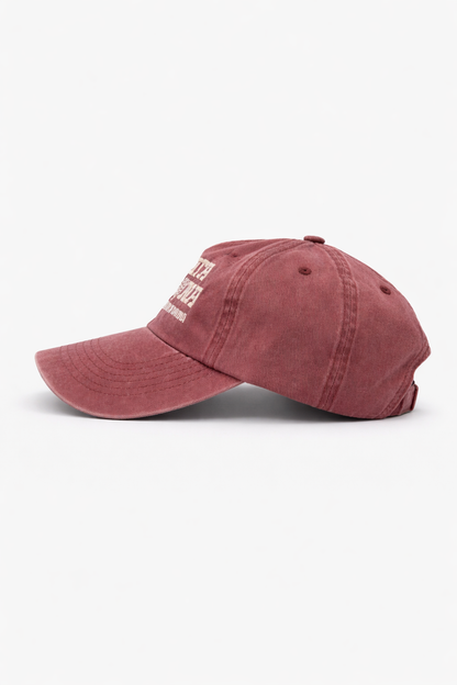 Marron Colored baseball cap with a brown strap on a white background, Picture of the Side