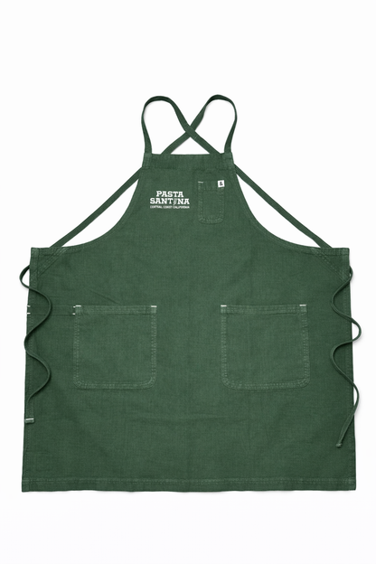 Green crossback apron with a logo on a white background