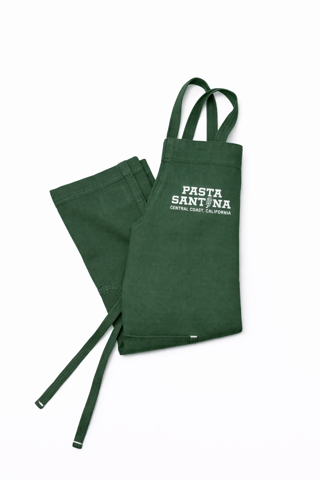 Green crossback apron, folded, with a logo on a white background