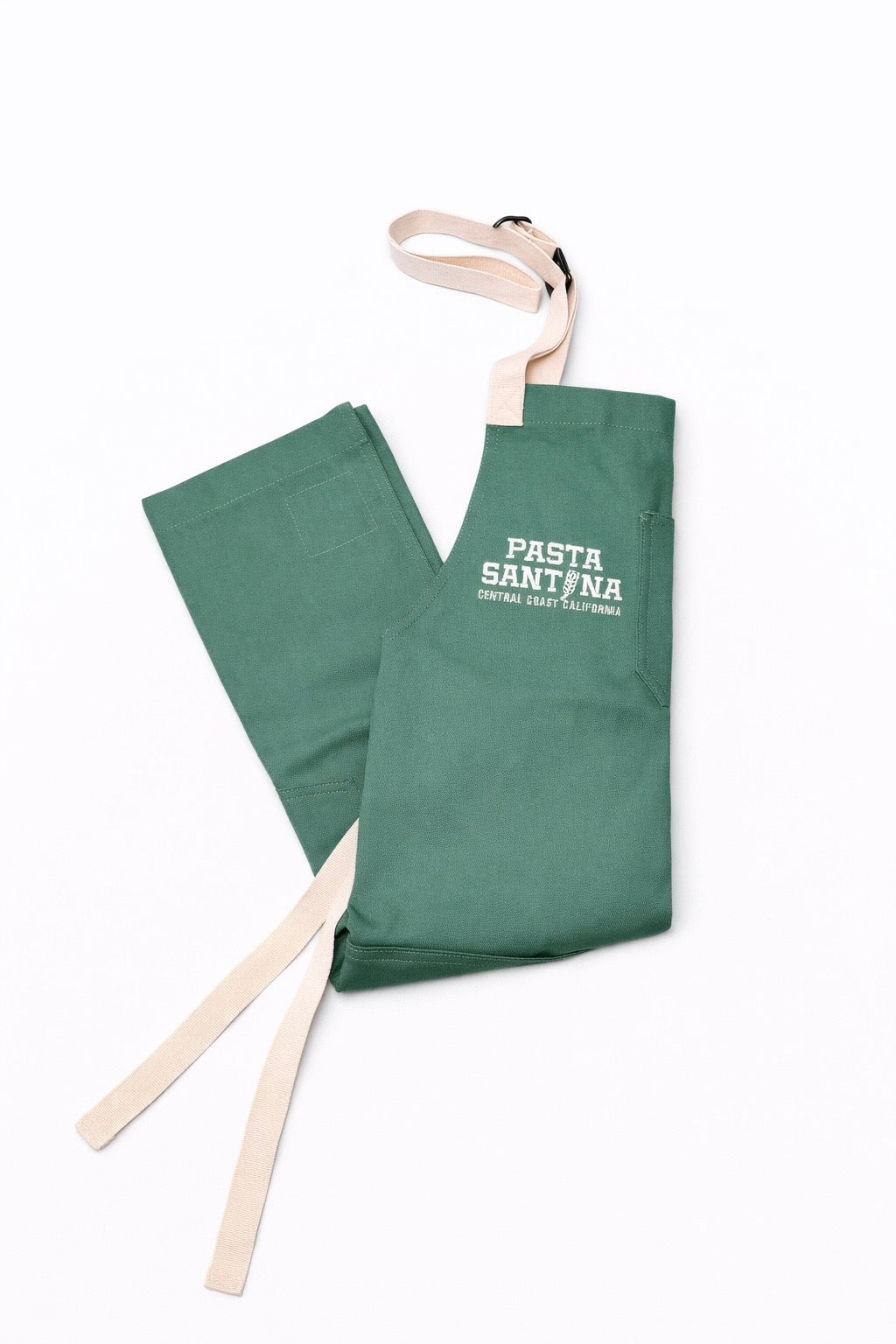 Julep Green apron with white straps on a white background, Folded