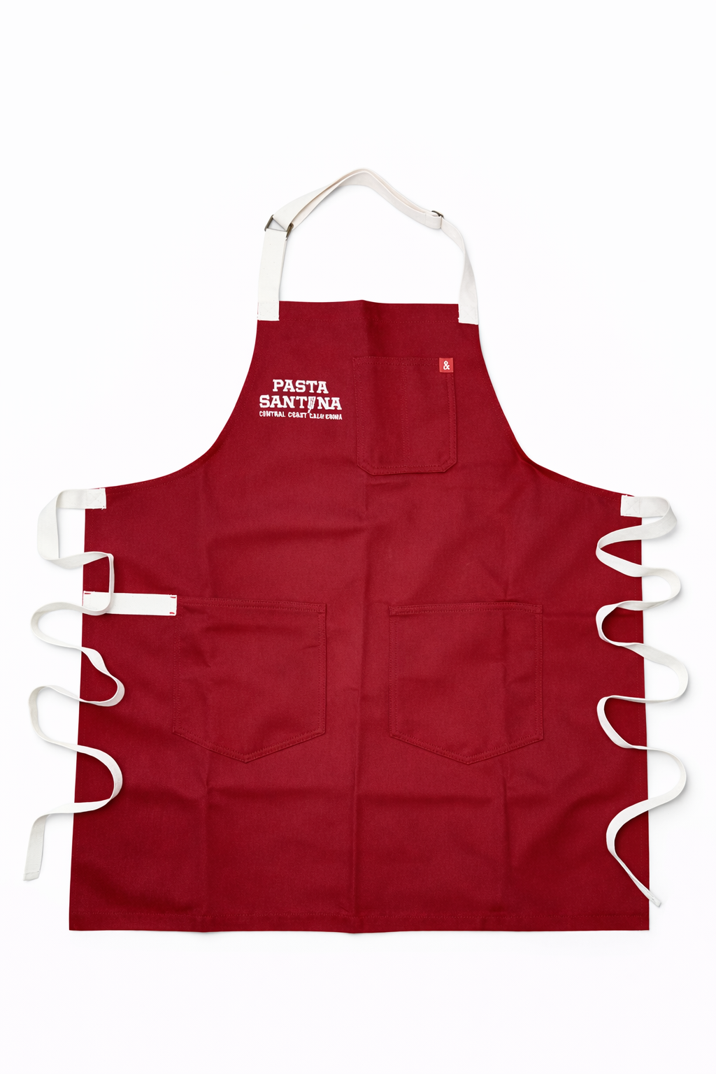 Red apron with white straps on a white background