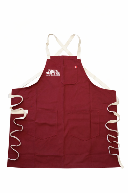 Red crossback apron with a logo on a white background