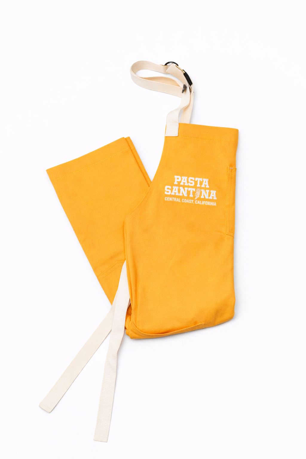 Yolk Colored apron with white straps on a white background, Folded